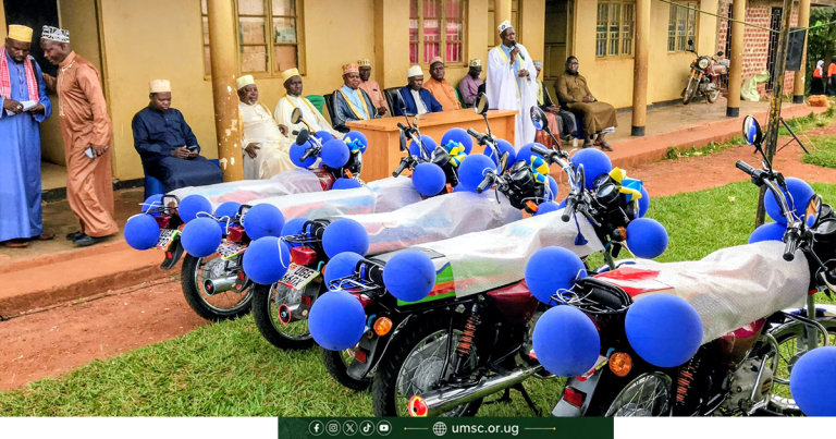 Second Deputy Mufti Sheikh Hafiz Bukenya handing over motorcycles to Muslim leaders in Kayunga